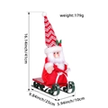 Santa Claus in red knitted hat on green sleigh with gift bag, dimensions 41cm x 25cm - Red Knit Hat Style