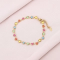 Detail of colorful enamel heart charms on a gold-plated stainless steel chain bracelet - Hearts & Enamel