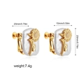 Detailed view of baroque pearl sunflower clip-on earrings with 20mm x 15mm dimensions - Sunflower