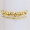 Three-piece set of golden beaded bracelets featuring a circular letter N pendant detail - Letter N