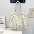 Detail of white waffle fabric tote with floral embroidery and colorful braided straps - Chiffon Small Floral White