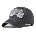 Detail view of washed cotton baseball cap with vintage distressed texture and 3D embroidery - Adjustable / 70 Black