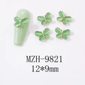 Detailed view of mint green cat-eye butterfly nail charm with golden metal edges - Cat Eye Stone Butterfly Gold Frame Style (9821)