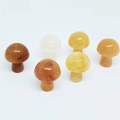 Polished natural agate stone mushroom miniature in warm golden and orange tones - Topaz