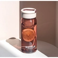 Dettaglio della bottiglia di tè portatile con filtro integrato e manico bianco - 650ml / Bianco