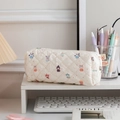Quilted off-white pencil case with colorful animal patterns and white zipper closure - Cartoon Character