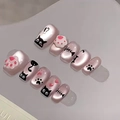 Detail of short pink press-on nails featuring black cartoon cat and fishbone patterns - By1669 Black Cat Jade Feet / Glue Type