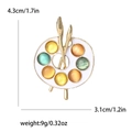 Vintage alloy enamel artist palette brooch with colorful gems and two small paintbrushes - White