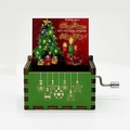 Hand-cranked green wooden Christmas music box with colorful painted holiday tree patterns - Christmas 40/Green/Wishing you a Merry Christmas Illustration