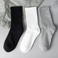 Three pairs of ribbed cotton crew socks in black, white, and grey for everyday wear - Single Elastic Long Socks / Black White Grey Mix