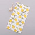 Soft six-layer cotton baby washcloth featuring vibrant yellow lemon prints on white gauze - Lemon