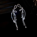 Silver bow earrings with sparkling rhinestone tassels and star pendant accents - Silver Pave Zirconia Bowknot Star Tassel Earrings (68# Silver Needle - Silver) / Silver