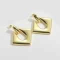 Detail of polished gold-plated hollow geometric square earrings for women with smooth finish - Diamond / Gold