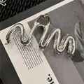 Sleek silver wave-shaped metal hair claw clip with a polished finish for women - M-Shape Wave Style / Large / Silver