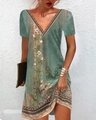 Short sleeve V-neck midi dress featuring ethnic floral prints in a vibrant green finish - S / Tops / T-Shirts / Green