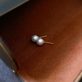 Macro shot of elegant lavender pearls and golden metal studs on a textured background - Silver Pin Pink (0.6)