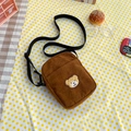 Brown corduroy crossbody phone bag for kids featuring a cute bear embroidery patch - Bag Only (No Charm) / Brown