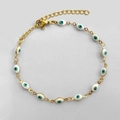 Golden Evil Eye link bracelet with twelve green almond-shaped evil eye charms - White Eye