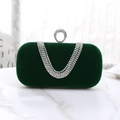 Detail of emerald velvet evening bag featuring rhinestone fringe and circular ring clasp - Green