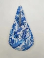 Detailed close-up of blue and white floral paisley textured magic stretch bubble bag fabric - Floral 15