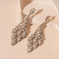 Detailed view of silver leaf tassel earrings featuring sparkling crystal rhinestones - Silver (Silver Earring Post)