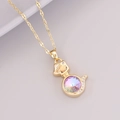 Macro shot of 18K gold fox pendant with colorful gemstone and crystal details - Snake (6# Snake)