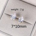Close-up of 7x10mm teardrop zircon earrings in gold setting weighing 2g each - 10MM Water Drop Gold
