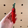 Handmade red chili wool felt keychain with smiling face and green stem on metal ring - Chili Pepper