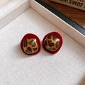 Close-up of retro leopard print stud earrings with red velvet borders in a jewelry box - 11# Silver Pin Red Round
