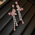 Close-up of pink butterfly drop earrings with long tassels and sparkling zircon stones - 52# Silver Needle - Pink - Silver.