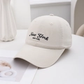 Detailed embroidery of 'New York' text on high-quality washed cotton baseball cap fabric - Off White