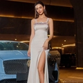 Detailed close-up of sequined bodice and high slit on silver satin party dress - S / Lotus root pink