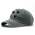 Detailed macro of vintage washed cotton baseball cap with New York embroidery and distressed brim - 56-60cm / Army Green