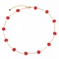 Elegant gold chain necklace featuring delicate red flower beads and a heart charm - Necklace / Red Flower