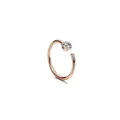 Detail of rose gold C-shaped nose ring featuring a sparkling round zircon crystal - Rose Gold