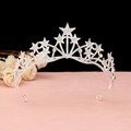 Detailed view of silver crystal tiara featuring intricate interlocking star patterns - No.14 Silver (White Stone)
