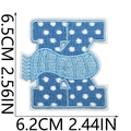 Close-up of blue embroidered patch showing precise dimensions 6.5cm height and 6.2cm width - Letter K