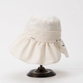 Detail view of wide brim sun hat with Senmao metal logo and adjustable drawstring - M (56-58cm) / Off White