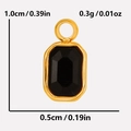 Detailed view of a small black rectangular glass stone pendant with gold steel frame - Gold/Black