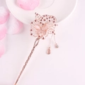 Rose gold flower hair pin with pink cat eye stone and purple tassels on white desk - Rose Gold Purple Rhinestone Flower Tassel (FZ025)