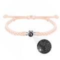 Pink braided rope bracelet with a circular black stone projecting I Love You in 100 languages - Brown Projection Bracelet - In Stock