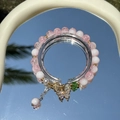 Exquisite pink and white beaded bracelet featuring a gold butterfly charm on a mirror - S028-pink Gold Butterfly Cheese Milk Tea Bracelet #sz223