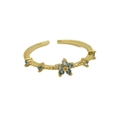 18k gold plated brass flower open ring with light blue zircon stones and dotted band - March