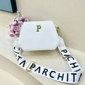 White hexagonal PU leather tote bag with gold P logo and printed wide shoulder strap - White with White Strap