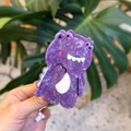 Detailed view of a purple dinosaur hair claw clip with smooth acetic acid texture - Purple Crocodile