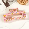 Detailed view of pink rectangular hair claw clip with colorful hearts and I LOVE YOU text - 8.5cm Heart Print - Style K Pink