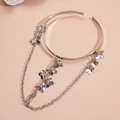 Vista dettagliata del bracciale da braccio a farfalla argento con catene a frange - Bracciale da braccio / Argento
