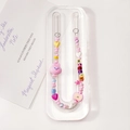 Pink beaded phone charm with rabbit and star charms on an acrylic stand display - Acrylic U-Shape Bead Tray