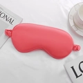 Pink silk sleep mask with elastic headband and smooth satin texture for travel - Watermelon red