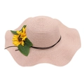 Detail of wide wavy brim straw hat with large sunflower and black ribbon trim - Pink